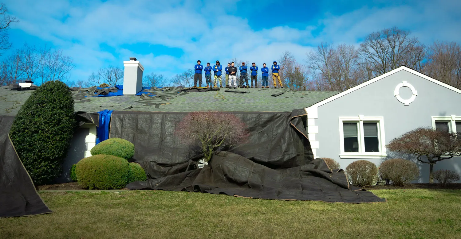LGM Roofing crew installing a new GAF asphalt shingle roof