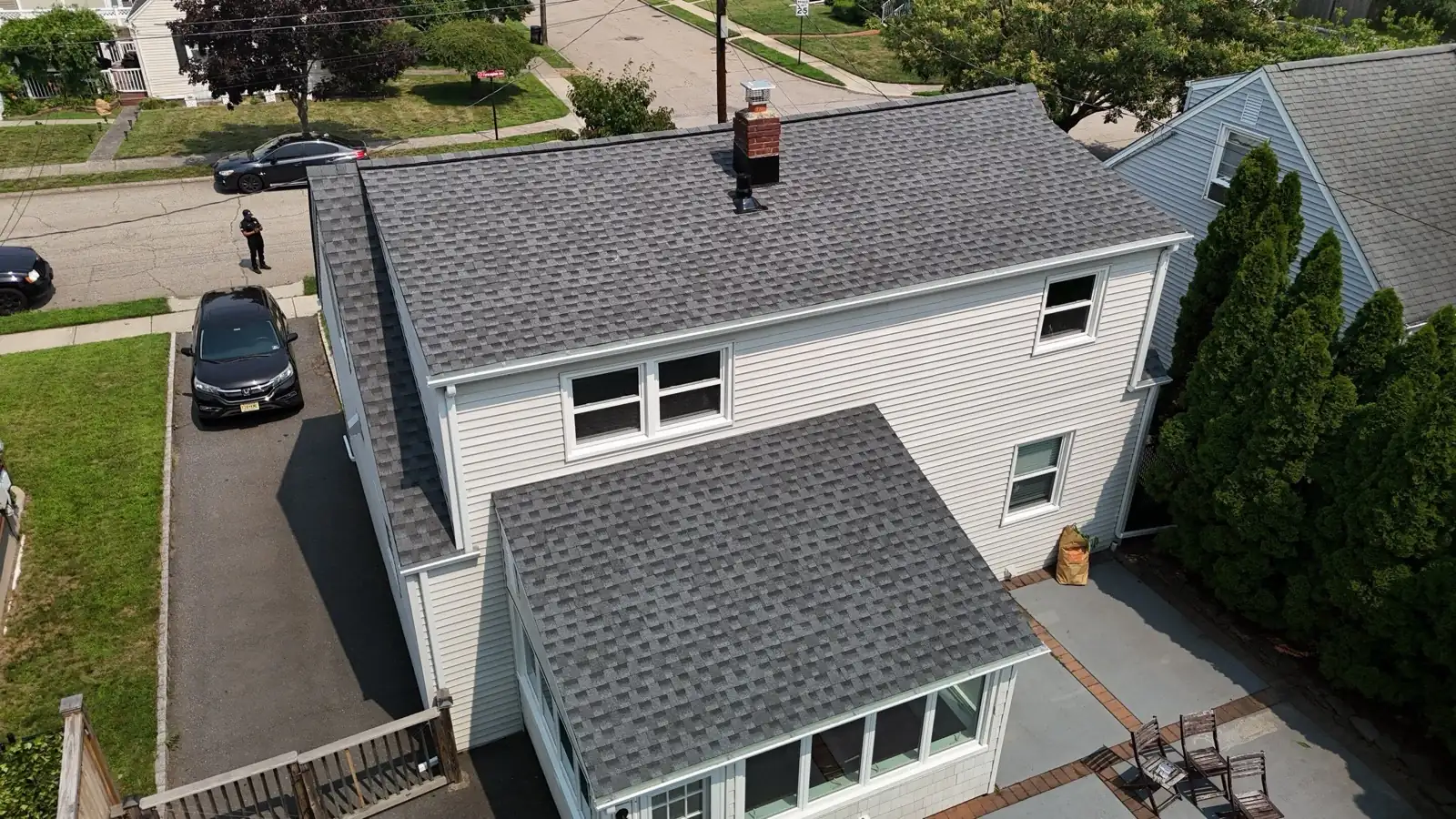 Drone view of a completed GAF shingle roof on a North Jersey colonial