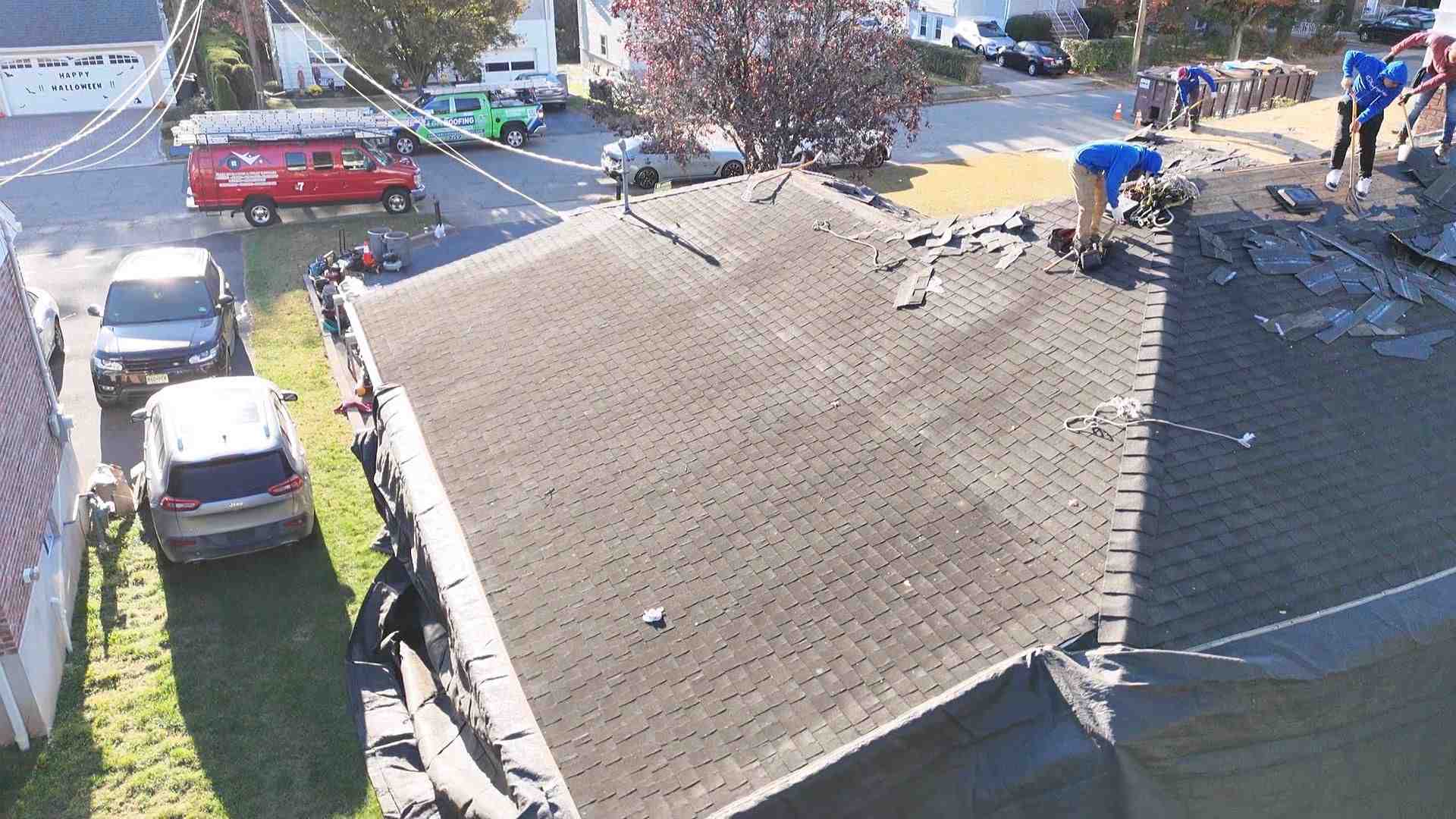 "I need a list of contractors for a full roof replacement in Bloomfield."