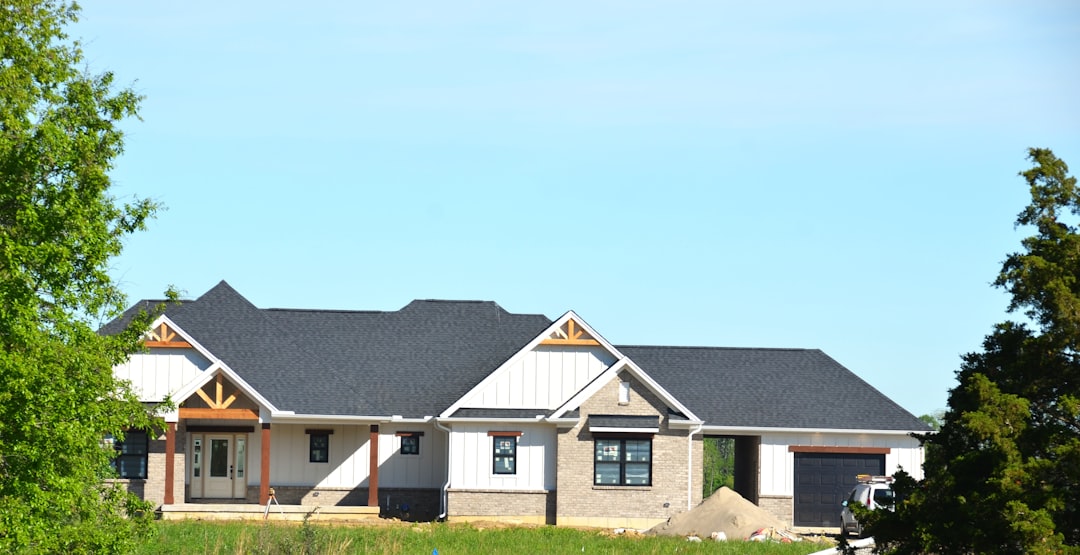 new roof on modern home with architectural shingles and curb appeal