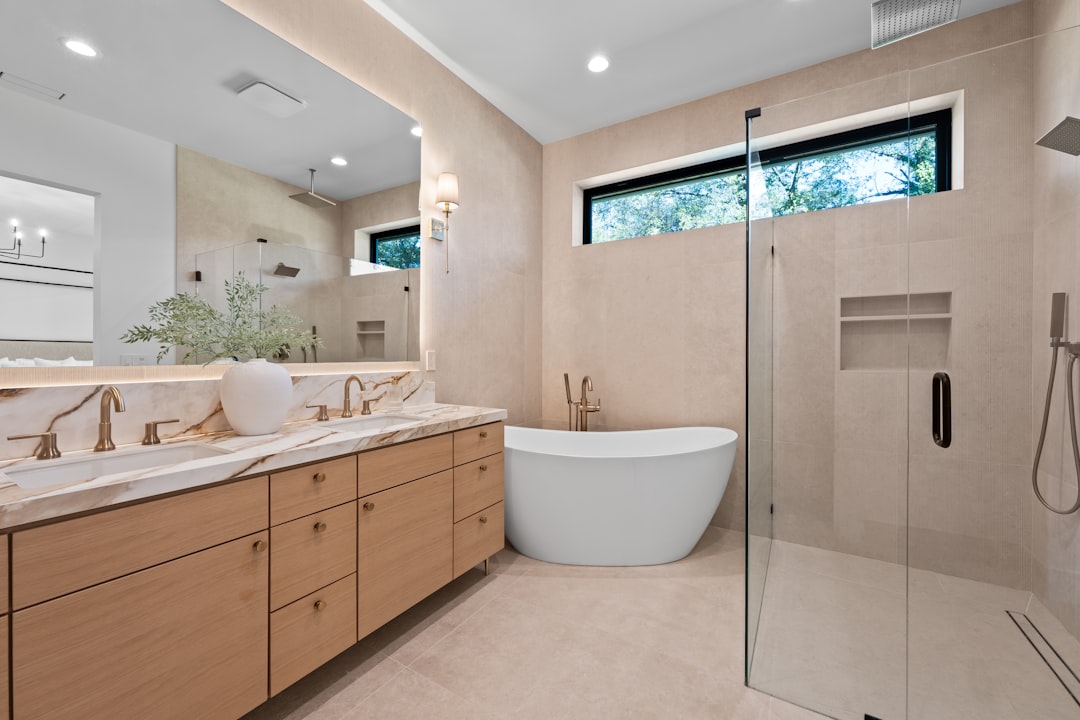 professional bathroom renovation with modern fixtures and luxury professionals and luxury finishes - when to hire a