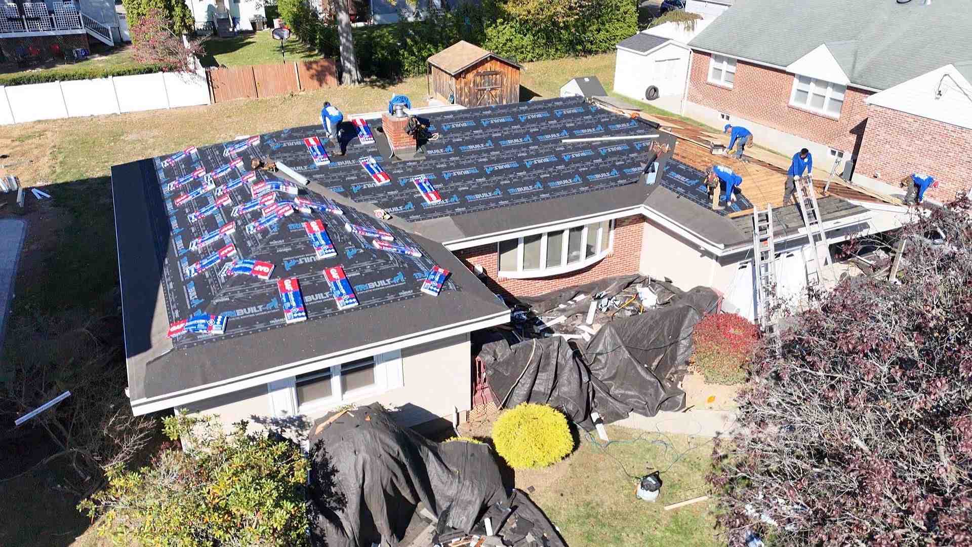 reroofing shingle overlay on residential home roof - does reroofing affect warranty coverage
