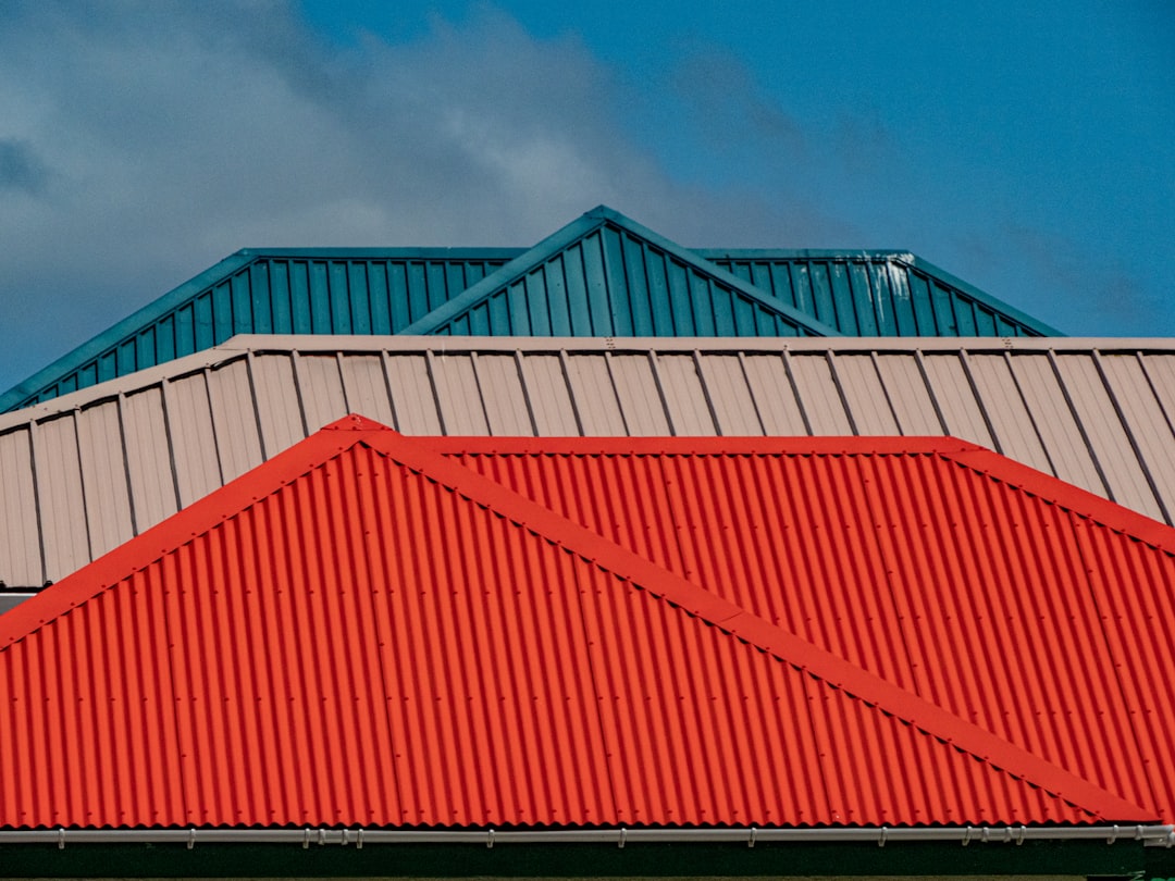 metal roofing cost vs asphalt shingles on modern home - metal roofing cost vs asphalt long term savings